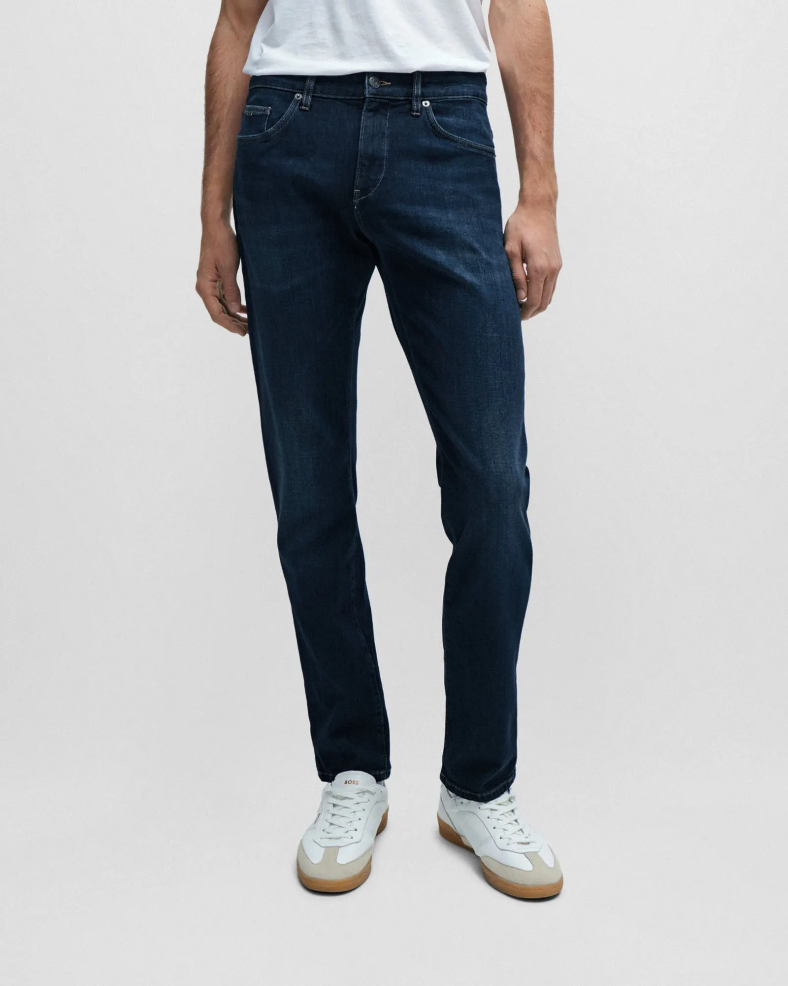 Jeans Delaware slim fit in cotone stretch lavaggio scuro stone washed con sabbiature